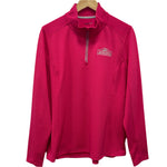 Pink long-sleeve shirt with a logo on a hanger against a white background
