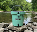 Mint green cooler with YKO logo on grass