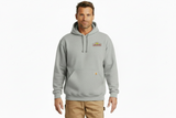 Man wearing a gray hoodie with a logo on a white background