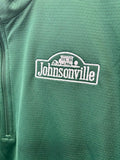 Green shirt with a white logo on a green background